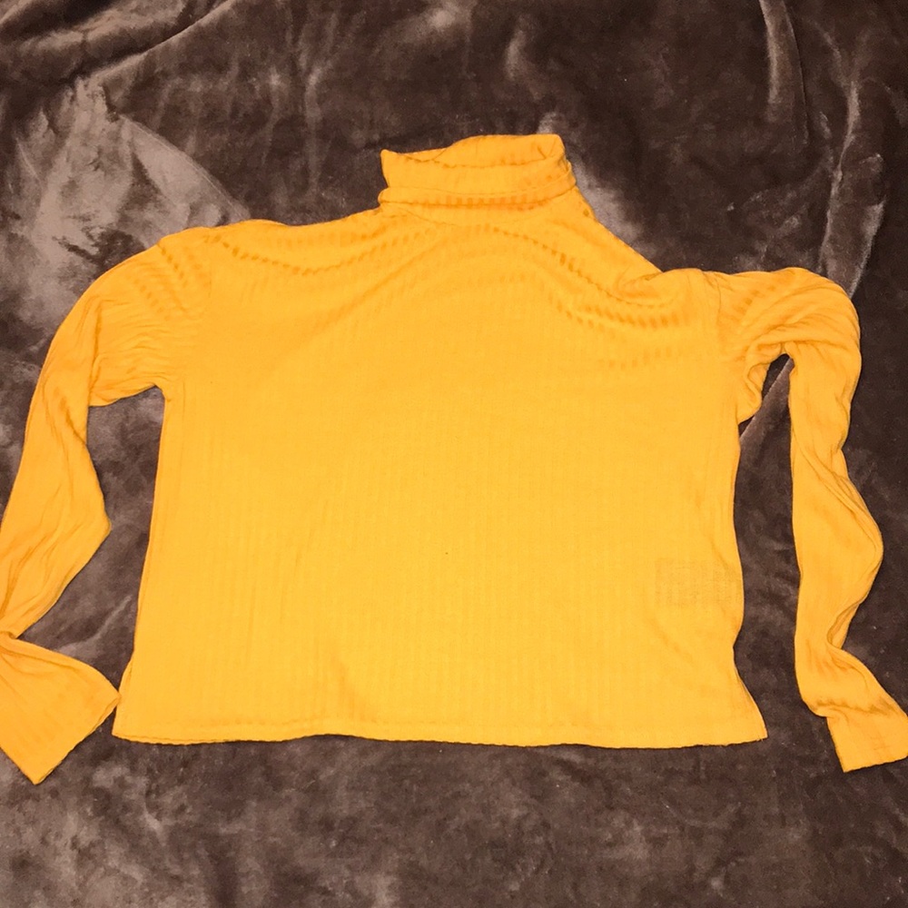 Yellow turtleneck shirt